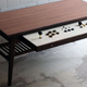 Illustration for article titled Fancy Coffee Table Turns Into Arcade Setup